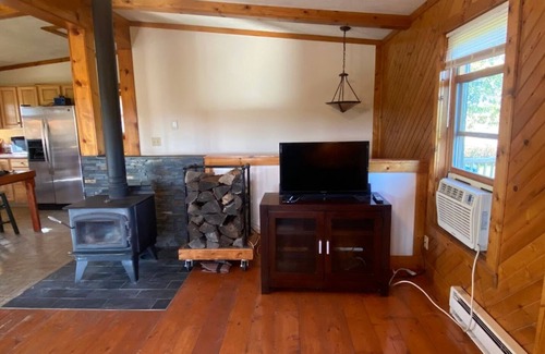 Opheim Cabina | Rustic and Secluded 1 Bedroom Cabin Retreat. Located on Private Stocked Pond.