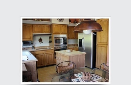 El Conquistador Casa | Campo de golf rústico patio hogar.