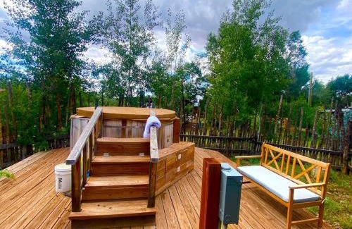 San Cristobal Casa | Rustic Log Cabin on Eco-Friendly Farm near Taos, New Mexico