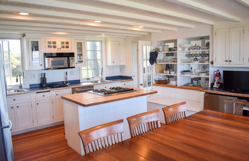 Dennis Casa | Rustic Oceanfront Retreat with Private Beach and Expansive Deck