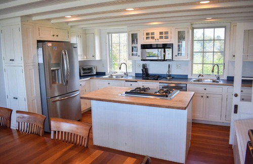 Dennis Casa | Rustic Oceanfront Retreat with Private Beach and Expansive Deck