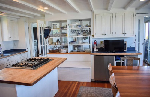 Dennis Casa | Rustic Oceanfront Retreat with Private Beach and Expansive Deck