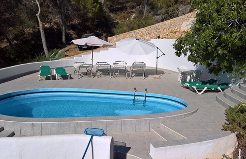 Sant Antoni de Portmany Villa | San Antonio. Calidad privada Villa + piscina. Vistas magníficas al mar, TV, Wi-Fi, aire Cond ..