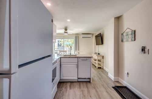 South Island Casa | Sand Dollar #2 - Downstairs Apt w Shared Pool on Canal by the Beach!