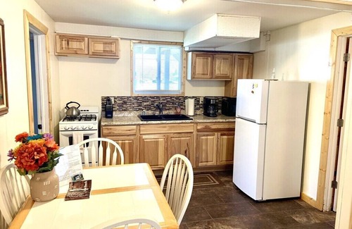 Christmas Apartamento | Santa's Shack Abajo - Cerca de las rocas en la foto