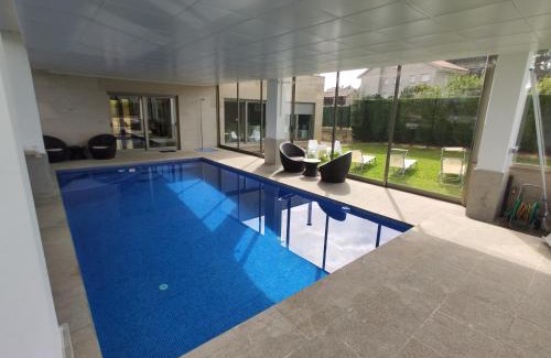 Sanxenxo Casa | Sanxenxo Casa Rial 47 con PISCINA CLIMATIZADA
