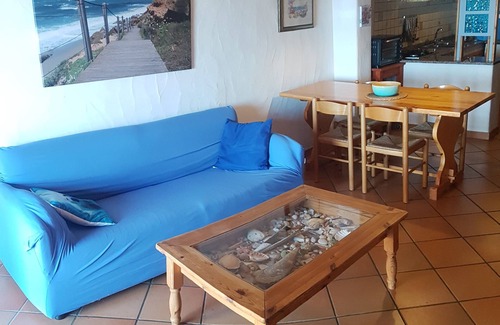 Funtana Meiga Apartamento | Sardinia Funtana Meiga Apartment with sea view CIN IT095018C2000S4495