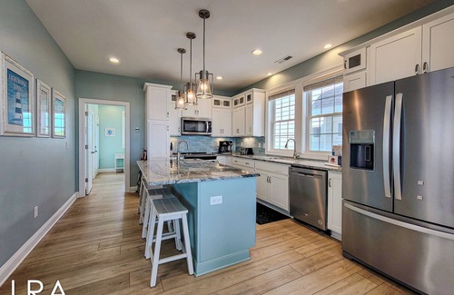 North Topsail Beach Casa | Sea For Yourself - Impresionante casa frente al mar con piscina comunitaria y jacuzzi privado.