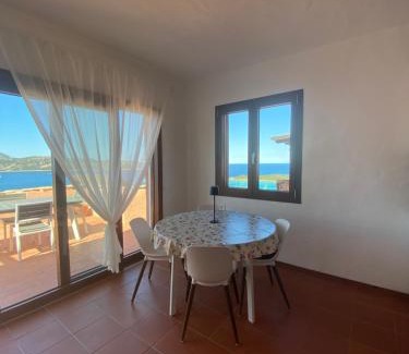 Capo Coda Cavallo Apartamento | Seagarden Home vista mare con giardino privato