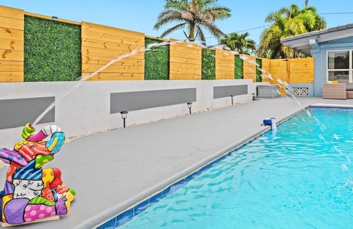 Lauderdale Isles Casa | Secluded Canal Sanctuary: Private Beach, Boat Dock, Pool, Mini-Golf Extravaganza