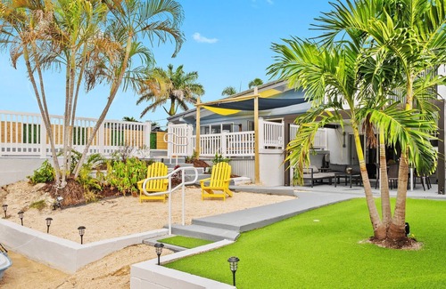Lauderdale Isles Casa | Secluded Canal Sanctuary: Private Beach, Boat Dock, Pool, Mini-Golf Extravaganza