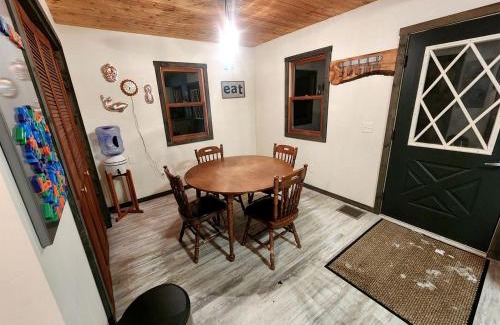 Paris Casa | Secluded Luxury Cabin with Hot Tub on 10 Private Acres near Trails in Reed City, Michigan