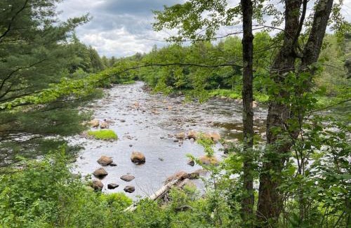 Hopkinton Casa | Secluded River Overlook Cabin on 160 acres.