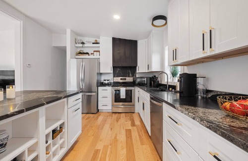 Rapid City Casa | Serene, Spacious Riverfront Home close to Torch Lake with lots of Entertainment