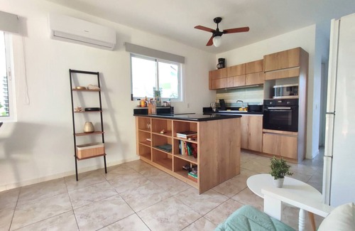 Lagun Casa | Serenity Haven: Retiro con Vista al Jardín en el Lagoon Bay"
