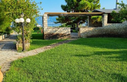 Stylida Casa | Silver Cape Raches on the sea