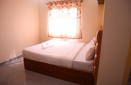 RR Nagar Hotel | Smilestay Karanji Paradise