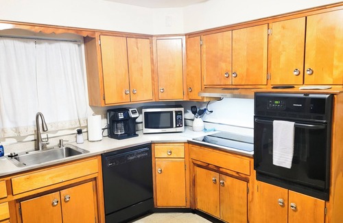 Columbus Casa | Solitude in the City! Beautiful home, easy access to all Columbus! 1/2 Acre Lot!
