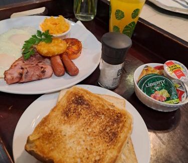 Brandwag Cama Y Desayuno | Solo Gracia Guesthouse