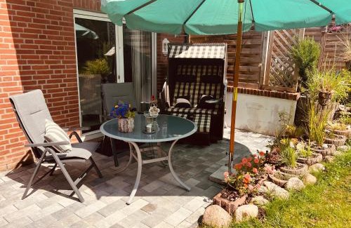 Schoenhagen Apartamento | SOLund - Sonne im Herzen - ruhige und sonnige Ferienwohnung mit Terrasse und Garten nahe Strand und Ostsee