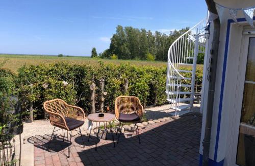 Monkebude Casa | Sonniges Strandhaus am Haff mit Wasserblick für 2-4 Personen