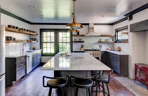 Village of Southampton Hotel | Southampton estate with oversized pool, chefs kitchen, vast lawn,.