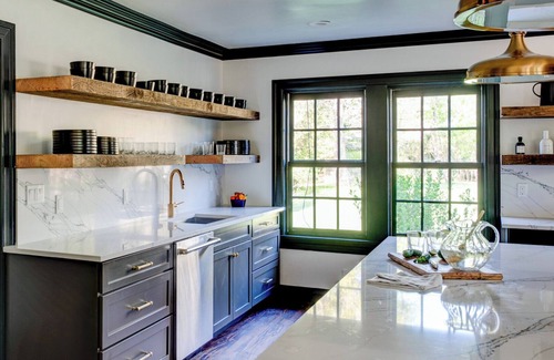 Village of Southampton Hotel | Southampton estate with oversized pool, chefs kitchen, vast lawn,.