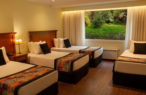 San Carlos de Bariloche Hotel | Spacious and Family Friendly Room Nestled in Forest Gardens and Nature