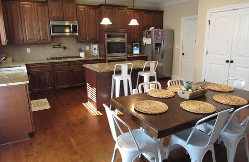 Evans Casa | Spacious 4-bedroom house in golf course neighborhood, sleeps 8+