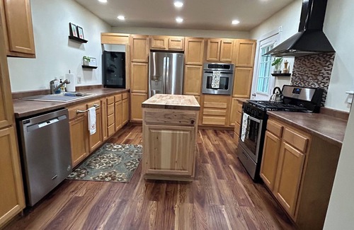 Bridgton Casa | Spacious, cozy home nestled in woods with private outdoor area and fire pit
