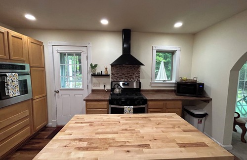 Bridgton Casa | Spacious, cozy home nestled in woods with private outdoor area and fire pit