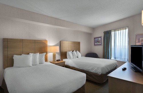 Arcadian Shores Complejo | Amplio condominio de 2 dormitorios con vista al mar + privilegios de alquiler oficiales en el lugar