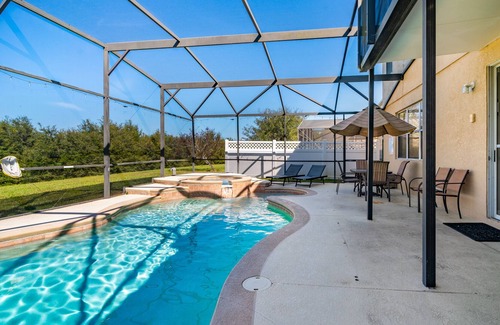 Legacy Park Casa | Piscina de 5 dormitorios, 4 baños, casa con sala de juegos, piscina privada y vista de conservación a la parte trasera