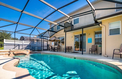 Legacy Park Casa | Piscina de 5 dormitorios, 4 baños, casa con sala de juegos, piscina privada y vista de conservación a la parte trasera