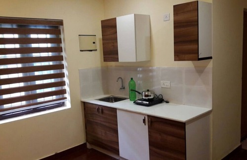 Kodungallur Apartamento | Apartamento estándar de una habitación con cama doble y ventilador