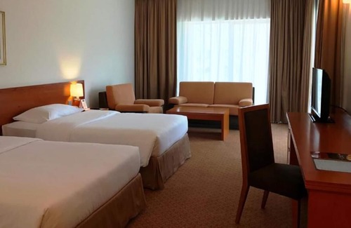 Garhoud Casa | Standard Room Near Garhoud Football Club By Luxury Bookings