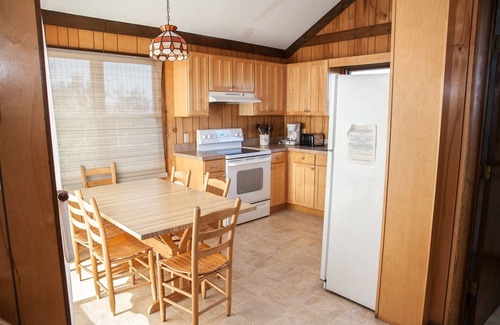 Frisco Cabaña | ¡Quédate en Sound Rider y ve en kayak por la puerta de atrás!