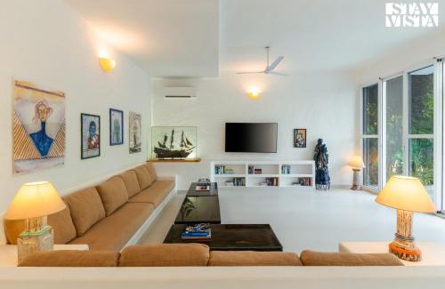 Mandrem Villa | StayVista at Aroha Palms Paradiso - Pool, Wi-Fi