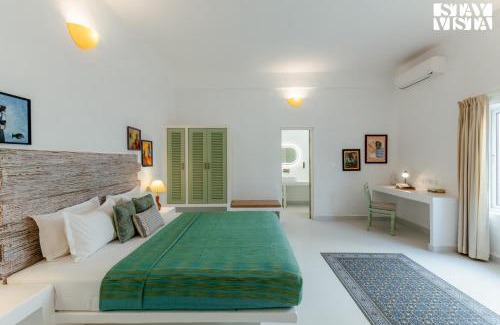 Mandrem Villa | StayVista at Aroha Palms Paradiso - Pool, Wi-Fi