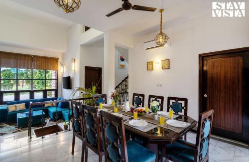 Dwarka Villa | StayVista at The Cityscape With Outdoor Pool