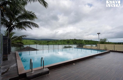 Wadgaon Villa | StayVista's Rivulet Waters - Lakefront Villa with Infinity Pool, Jacuzzi, Lawn, and Rustic Gazebo