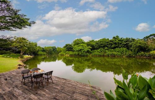 Indore Villa | StayVista's Water Song Garden - Lake-Side, Pet-Friendly Villa with Bar, Spacious Lawn & Indoor-Outdoor Games