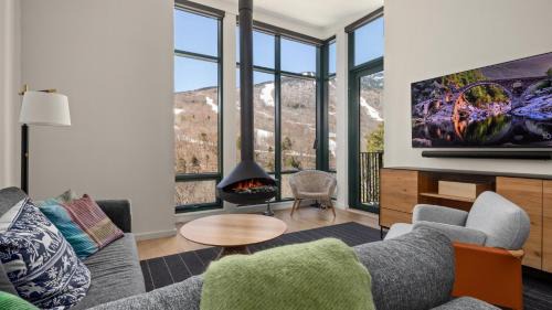 Stowe Area Apartamento | Stowe Mt Resort Treehouse Ski in Ski Out Mt Views By Stowe Mountain Rentals