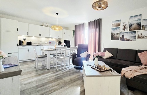 Tossens Apartamento | StrandGut 49 - Penthouse with a view. Sauna. Roof terrace. Exclusive.