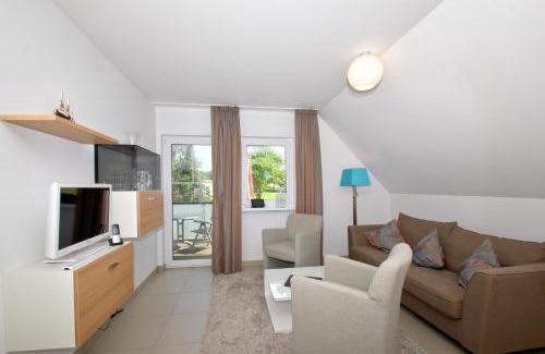 Lobbe Apartamento | strandnahe FeWo mit Balkon, gratis Nutzung vom AHOI Erlebnisbad und Sauna in Sellin - Rex Rugia FeWo 30-8