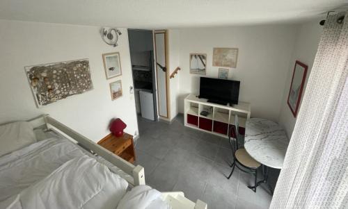 Le Couchant Apartamento | Studio a la mer piscine wifi parking clim