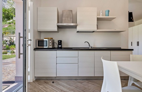 Dro Apartamento | Apartamento estudio 'Monte Brento Gaggiolo' con vistas a la montaña y jardín privado