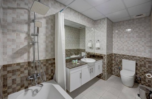 Dubai Investment Park Hotel | Studio Apartment Near Dunes Village Dip By Luxury Bookings