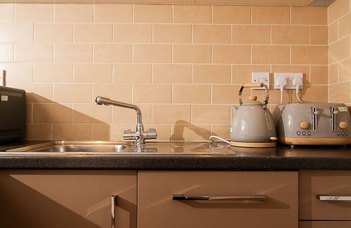 Chedington Apartamento | Estudio-Baño con bañera