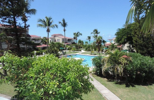 Dickenson Bay Villa | Impresionante apartamento junto a la playa en la hermosa bahía de Dickenson